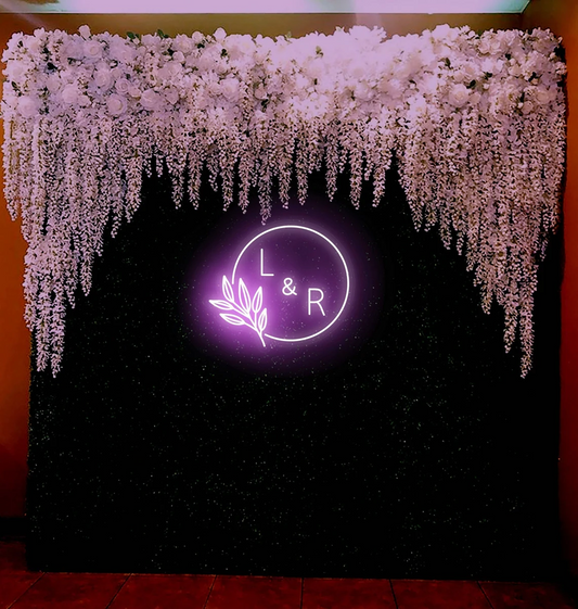 Glowing DIY wedding neon sign in a purple light for engagement or ceremony décor