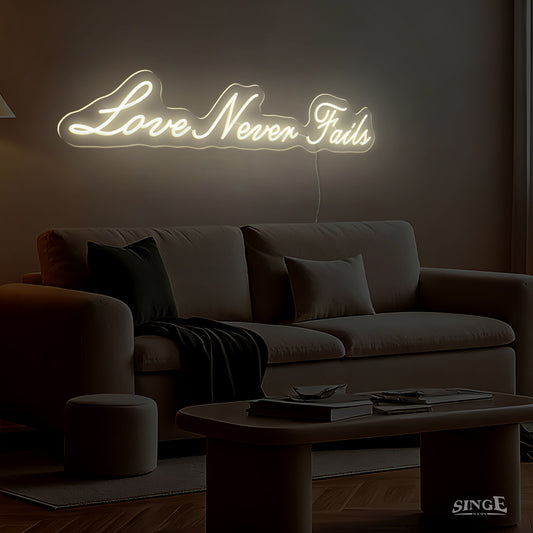 Singeee's "Love Never Fails" led neon sign light up in night in a living room
