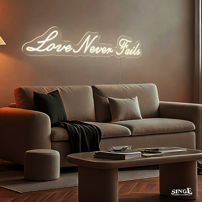 "Love never fails" led neon sign shine in a living room
