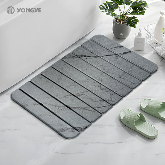 stone bath mat fast drying in bathroom