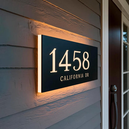 led-address sign shine in front of the door with a warm light